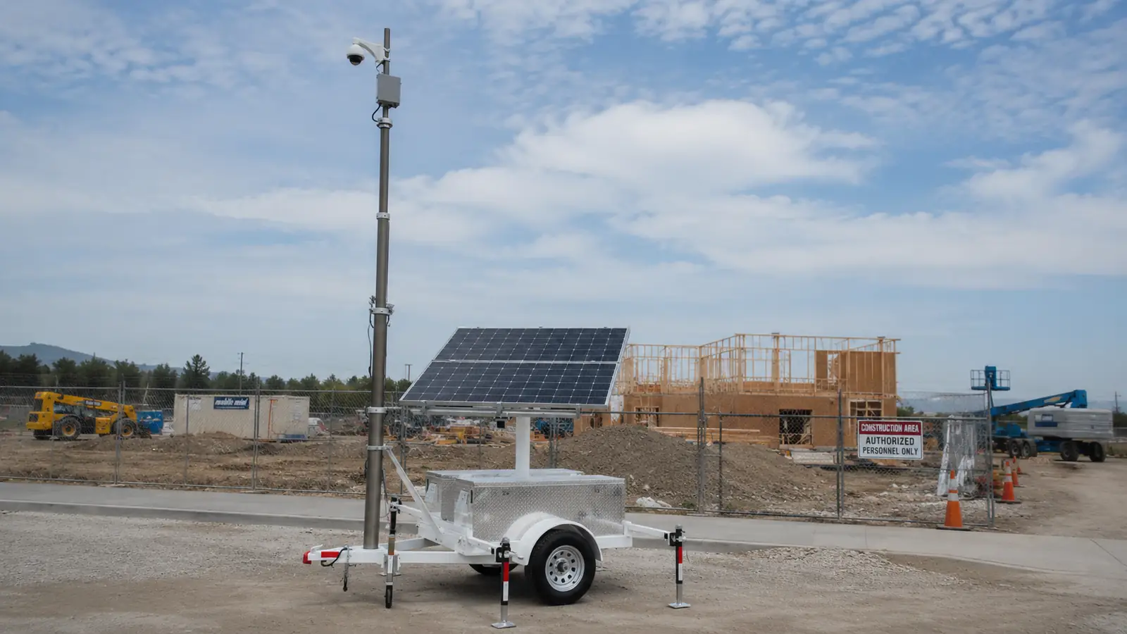MobileSolarPro solar surveillance trailer deployed at a construction site for temporary security coverage